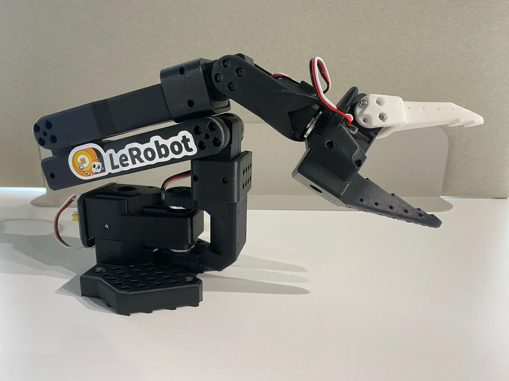 LeRobot SO-101 follower arm — the open-source base I adopted